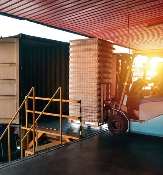 Forklift Handling Empty Bin — Adrian’s Destruction Services In Molendinar, QLD